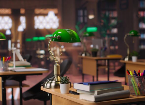 Refined vintage library with wooden shelves and classic green lamps